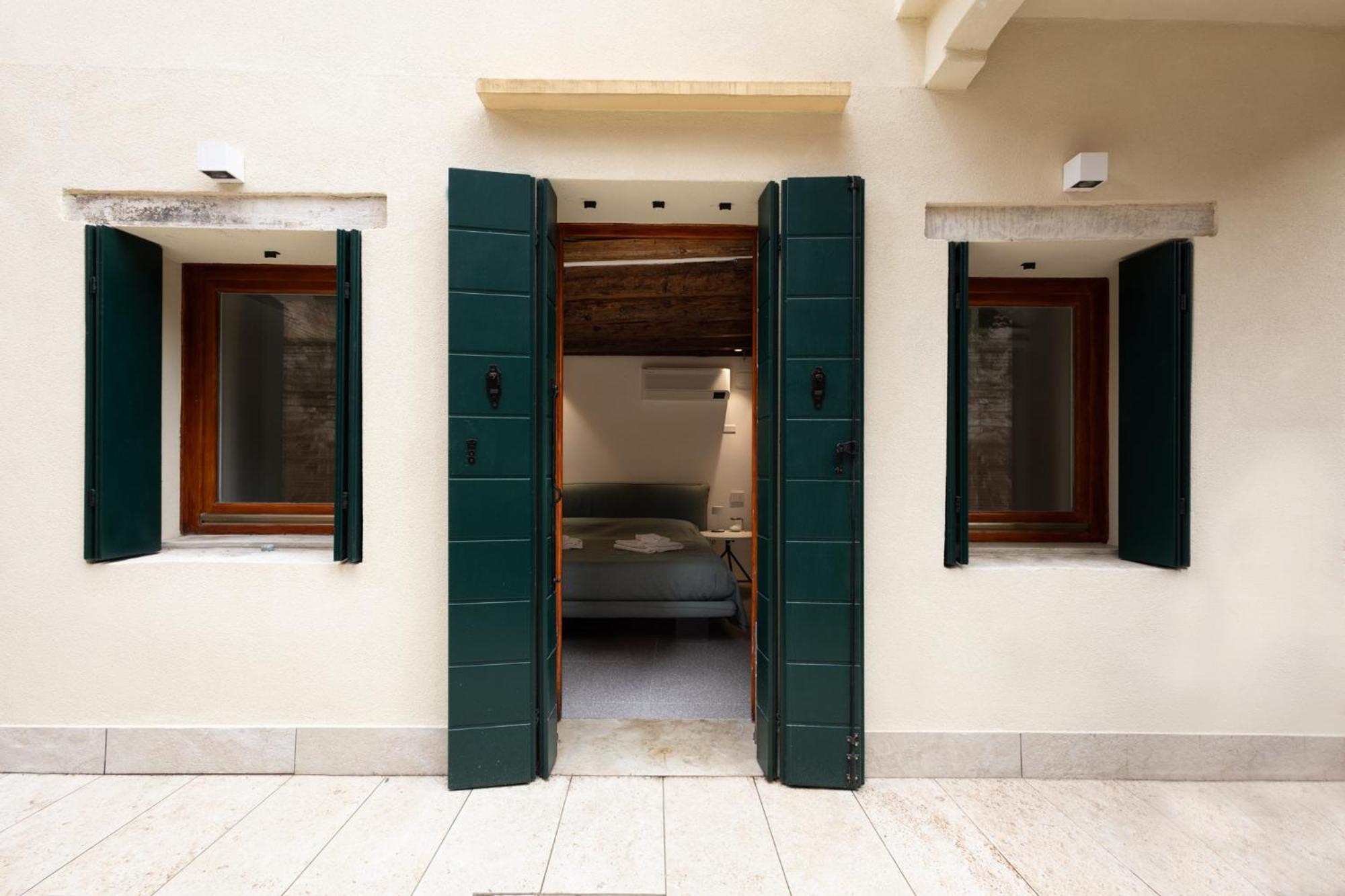 Appartement Peggy's Retreat Luxbotiquehome ~ Wifi + Patio Venise
